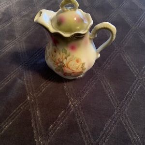 German floral pitcher with lid.